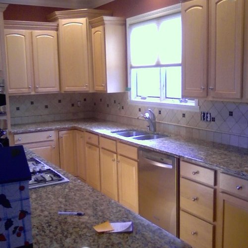 Traditional kitchen with white tile backsplash in New Palestine