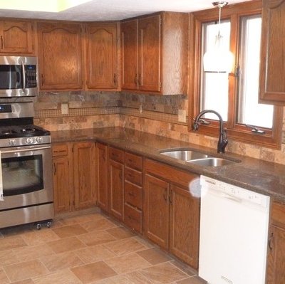 Traditional kitchen with new tile installed by Rick Short Flooring